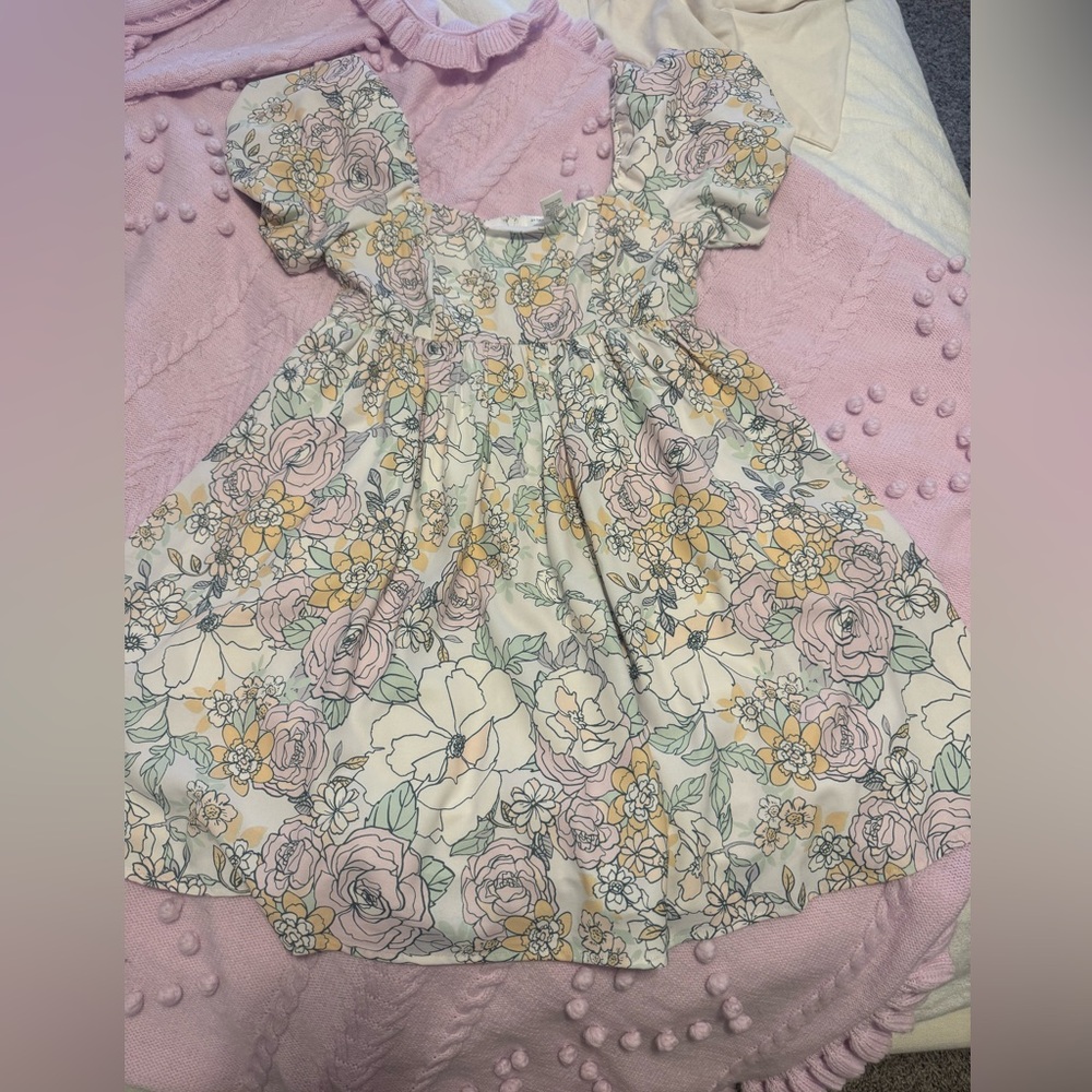 Altar'd state floral dress with puffy sleeves. Never been worn